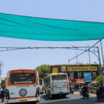 Rajkot Municipal Corporation’s Thoughtful Summer Initiative Shade Cover and Cooling Water Sprinklers at Trikon Baug Chowk Bring Relief to Citizens